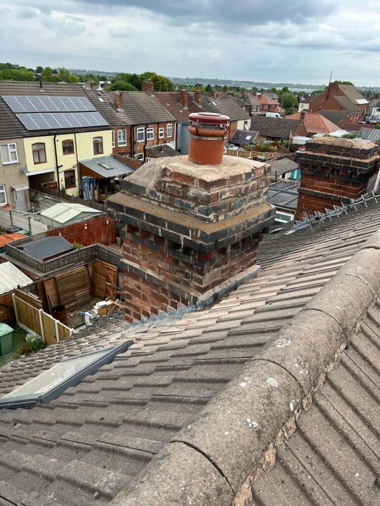 This is a photo taken from a roof which is being repaired by LJ Roofing Haydon Wick it shows a street of houses, and their roofs